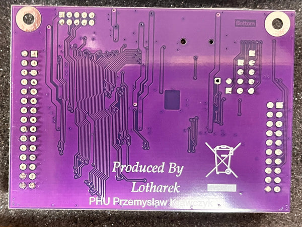Purple circuit board with 'Produced By Lotharek' text on a dark surface